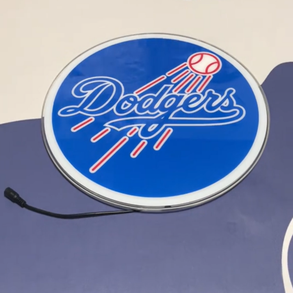 Neon sign featuring the Dodgers logo in blue and white, perfect for fan caves and sports decor.