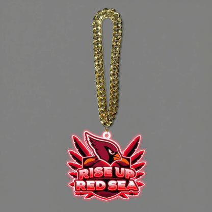 American football logo necklace with gold chain, featuring 'Rise Up Red Sea' symbol for superfans.